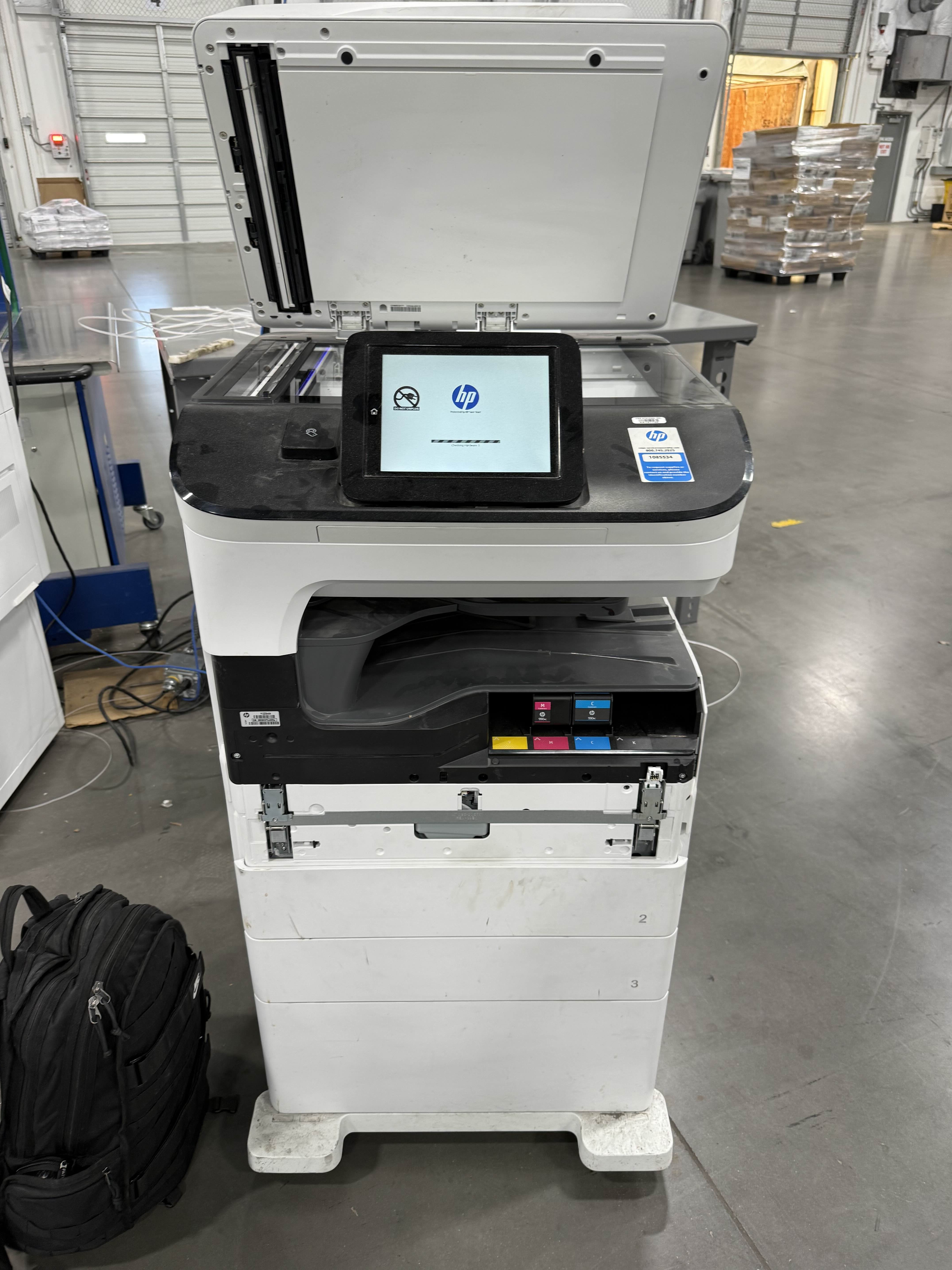HP Color LaserJet Enterprise MFP open for on-site repair in Dallas warehouse