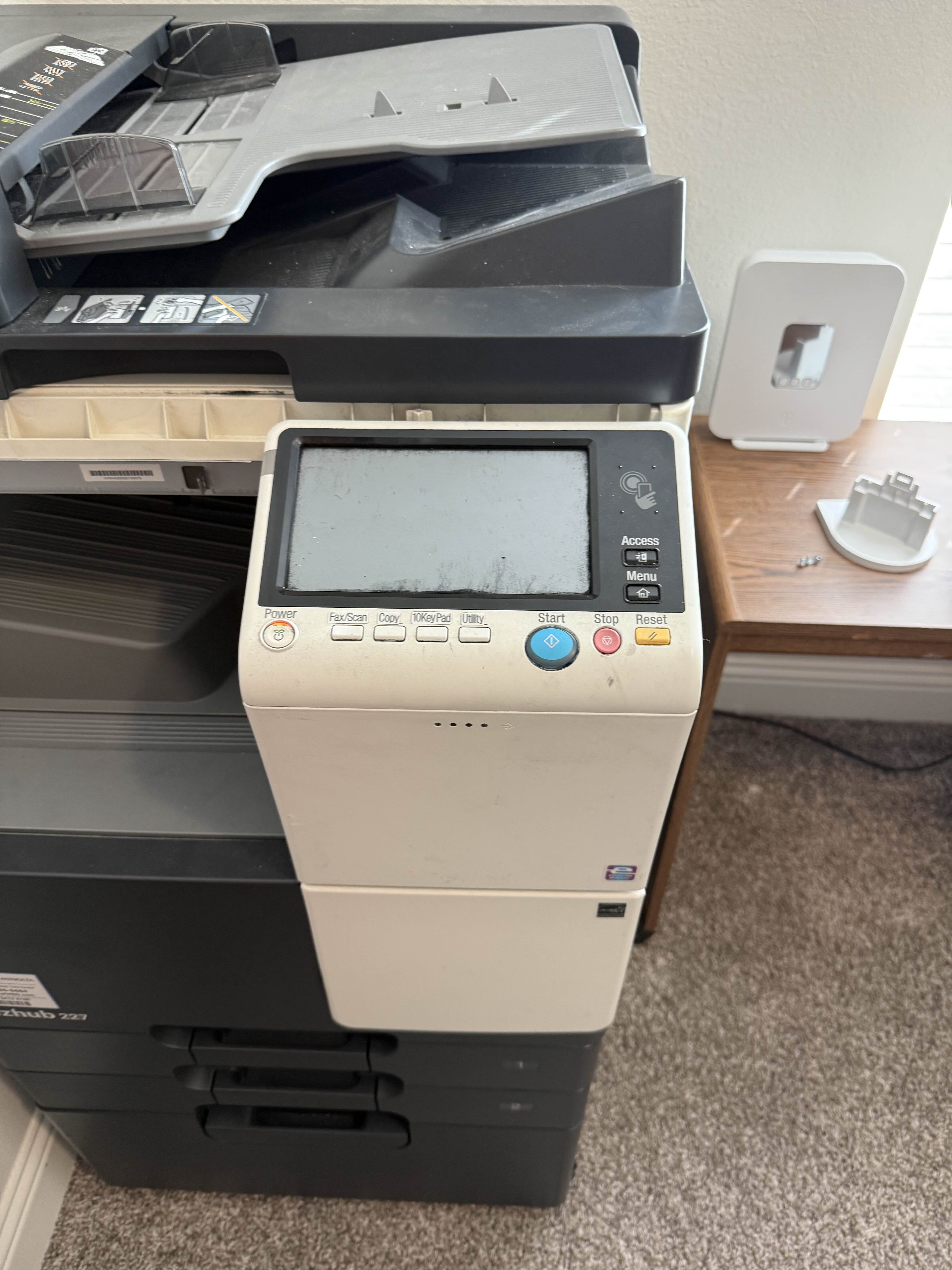 Konica Minolta bizhub 227 MFP full front view during on-site repair in Dallas