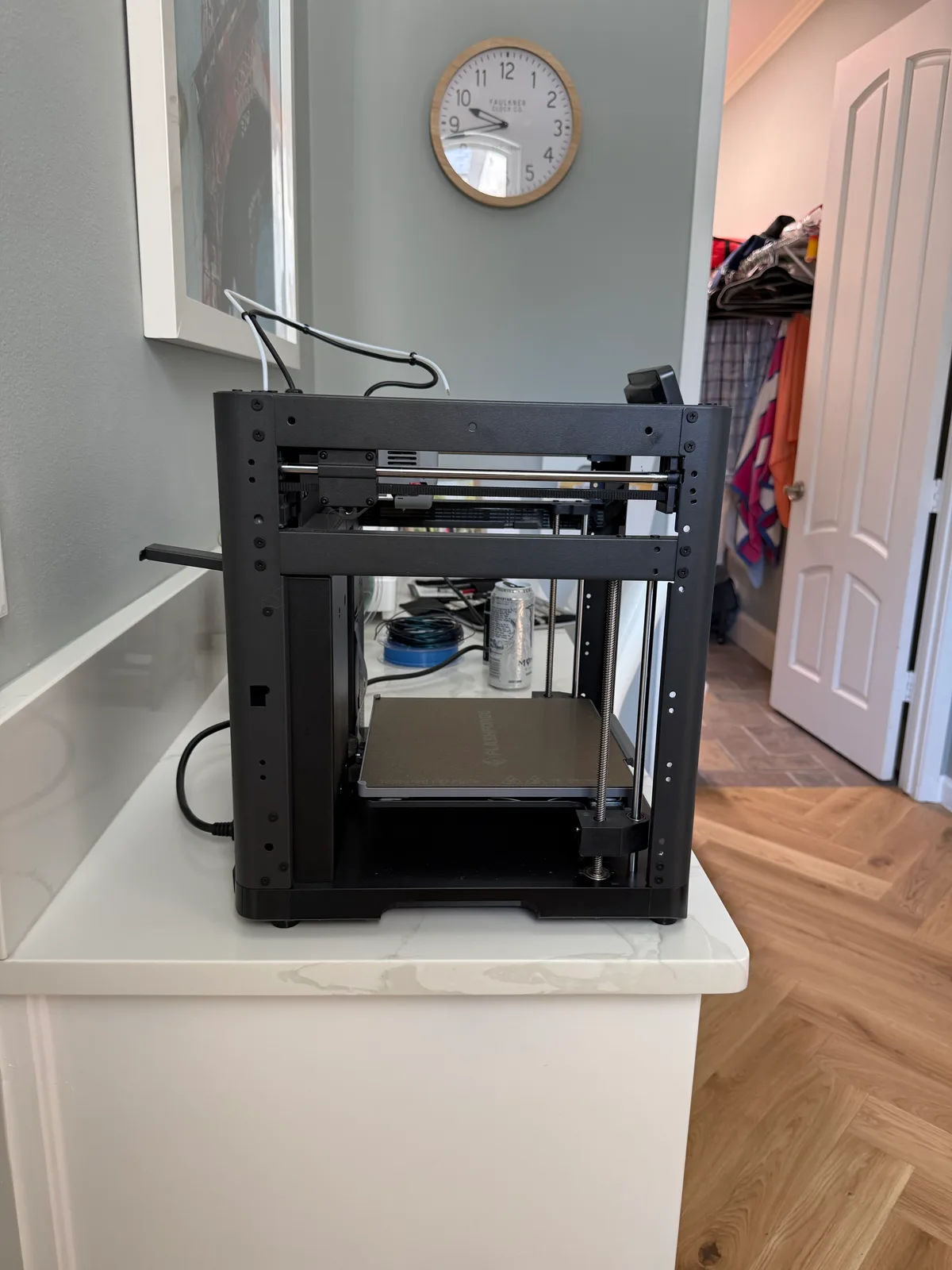 3D printer frame open on the side panel during an on-site service call in Dallas-Fort Worth